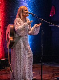 Check out your photos with MaRynn Taylor at the Flying Pig Tavern on Friday, October 13th, 2023.