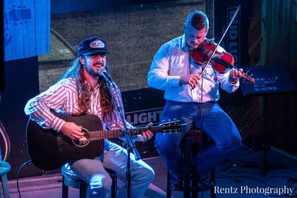 Check out your photos with Ian Munsick at  W.O. Wrights on Tuesday, September 21st, 2021.
