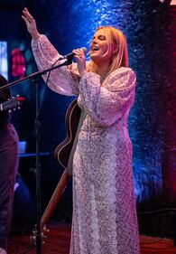 Check out your photos with MaRynn Taylor at the Flying Pig Tavern on Friday, October 13th, 2023.