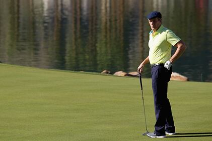 LA QUINTA, CA - JANUARY 17:  Michael Bolton plays the eighteenth hole on the Arnold Palmer Private Course at PGA West during the second round of the Humana Challenge in partnership with the Clinton Foundation on January 17, 2014 in La Quinta, California.  (Photo by Todd Warshaw/Getty Images)