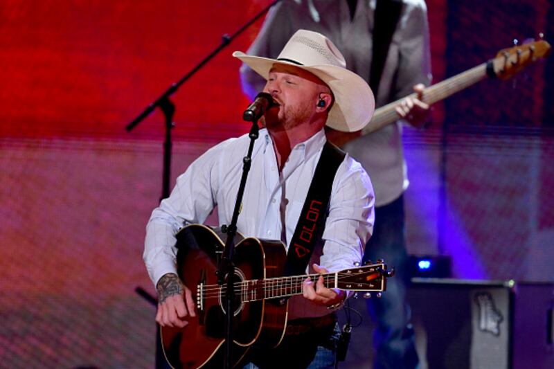 Cody Johnson performing on stage