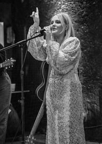 Check out your photos with MaRynn Taylor at the Flying Pig Tavern on Friday, October 13th, 2023.