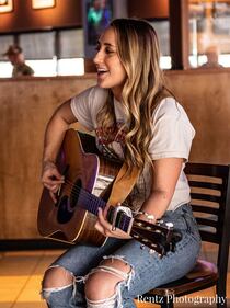 Check out your photos with Ashley Cooke at Milano's on Brown Street from April 5th, 2022.