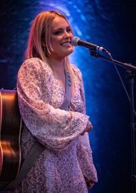 Check out your photos with MaRynn Taylor at the Flying Pig Tavern on Friday, October 13th, 2023.