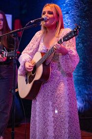 Check out your photos with MaRynn Taylor at the Flying Pig Tavern on Friday, October 13th, 2023.