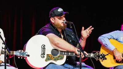 NASHVILLE, TENNESSEE - JULY 11: Luke Combs performs onstage for a songwriter round at Country Music Hall of Fame and Museum on July 11, 2024 in Nashville, Tennessee. (Photo by John Shearer/Getty Images for the Country Music Hall of Fame and Museum)