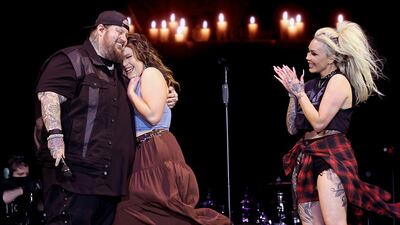 INDIO, CALIFORNIA - APRIL 26: (FOR EDITORIAL USE ONLY) (L-R) Jelly Roll, Bailee Ann and Bunnie Xo are seen at the T-Mobile Mane Stage during the 2024 Stagecoach Festival at Empire Polo Club on April 26, 2024 in Indio, California. (Photo by Amy Sussman/Getty Images for Stagecoach)