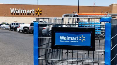 FILE PHOTO: Walmart is raising its minimum wage. Workers will see the pay increase in March.