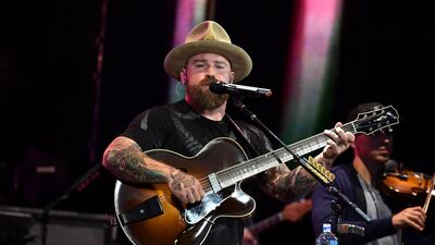 BOSTON, MA - JUNE 15: Zac Brown of Zac Brown Band performs on stage during the "Down The Rabbit Hole" Tour in Boston at Fenway Park on June 15, 2018 in Boston, Massachusetts. (Photo by Theo Wargo/Getty Images for Zac Brown Band)