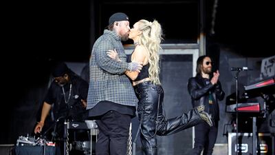 INDIO, CALIFORNIA - APRIL 26: (FOR EDITORIAL USE ONLY) (L-R) Jelly Roll and Bunnie Xo are seen onstage at the T-Mobile Mane Stage during the 2025 Stagecoach Festival on April 26, 2025 in Indio, California. (Photo by Frazer Harrison/Getty Images for Stagecoach)
