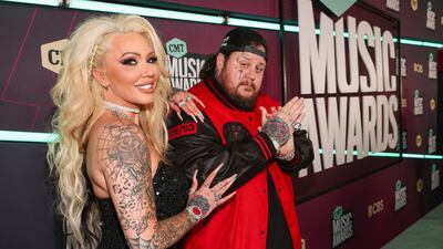 Bunnie Xo and Jelly Roll arrive at the 2023 CMT Music Awards held at Moody Center in Austin.